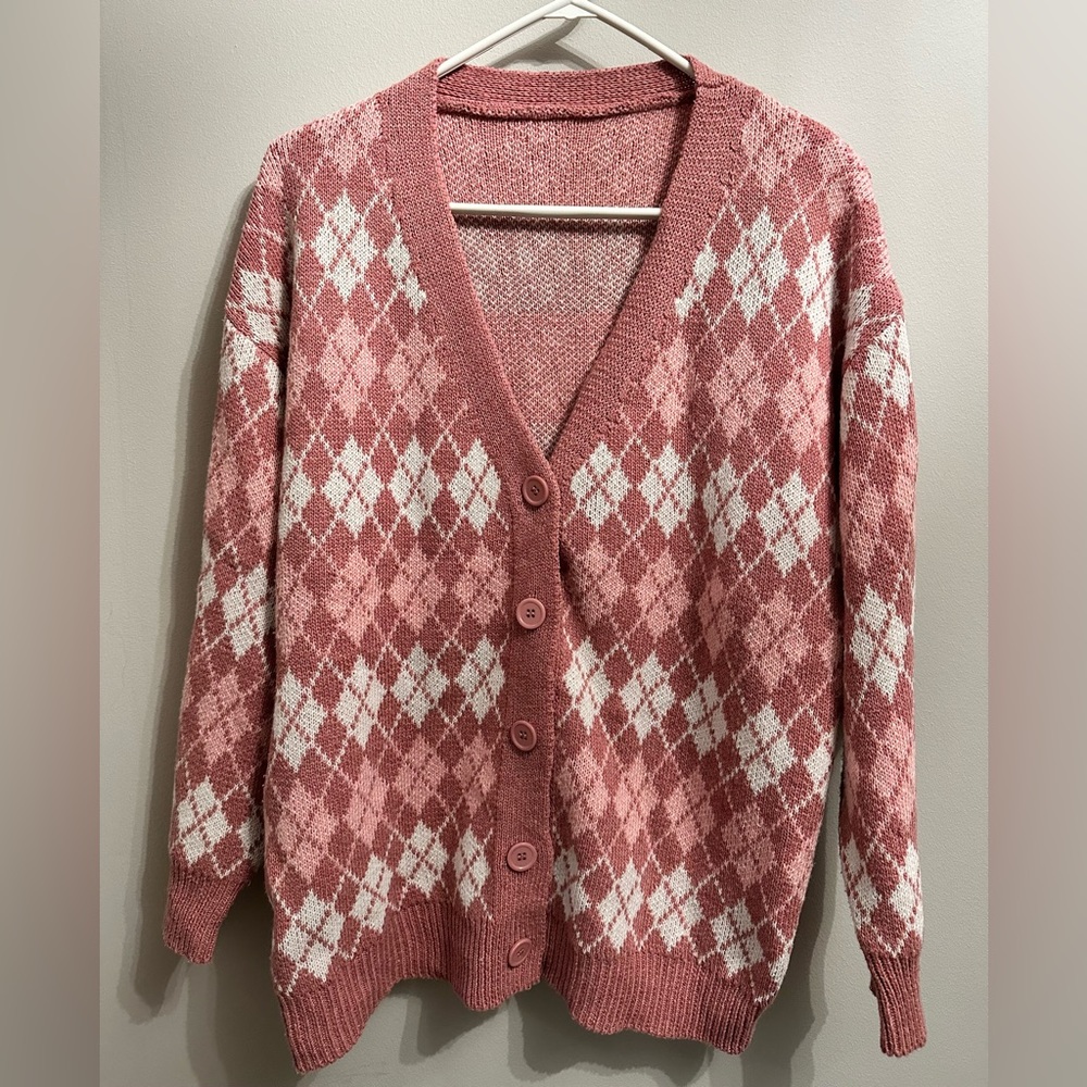 Cardigan-cute worn over under layer or alone.